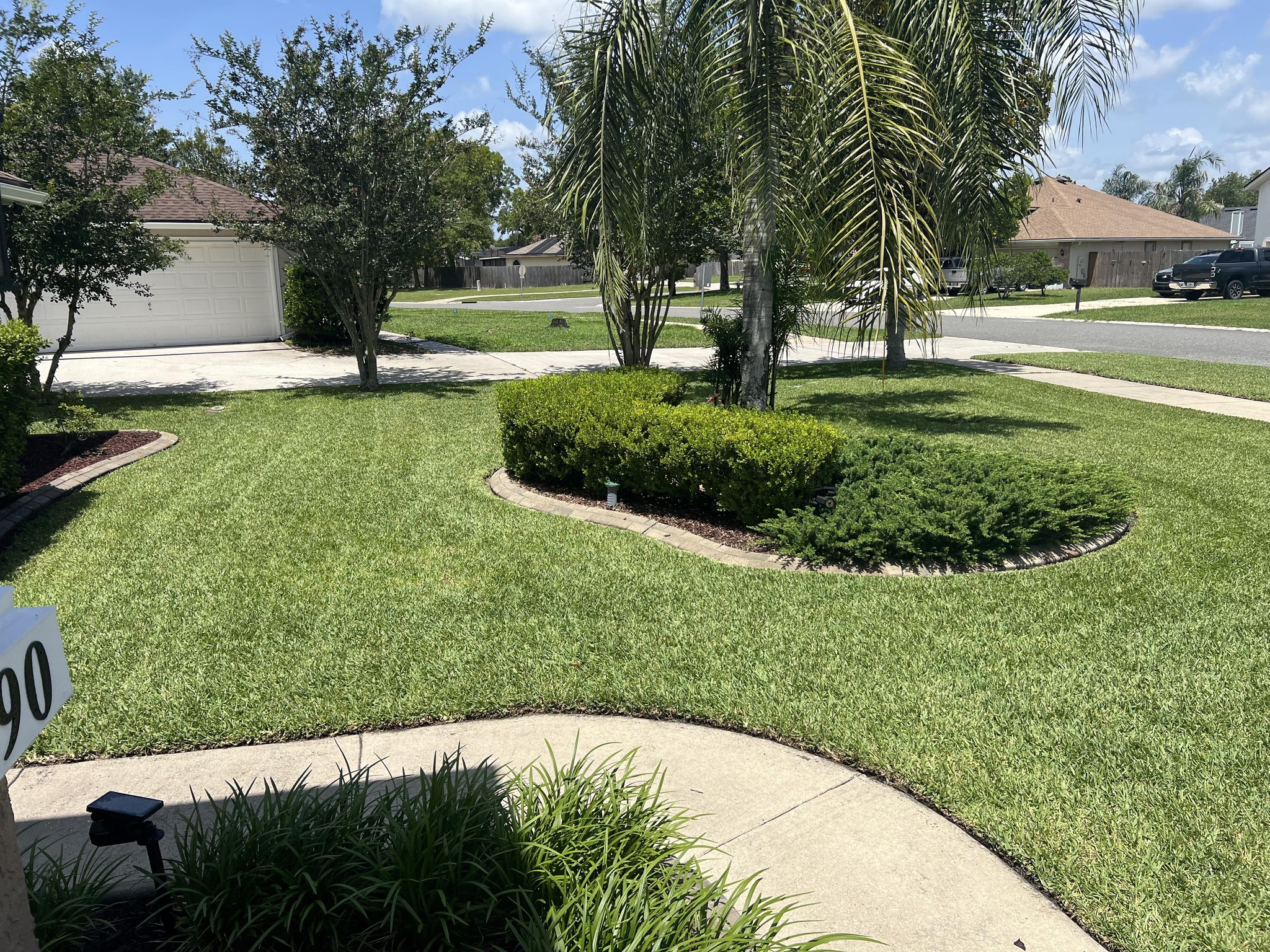 Foundation landscaping with decorative elements